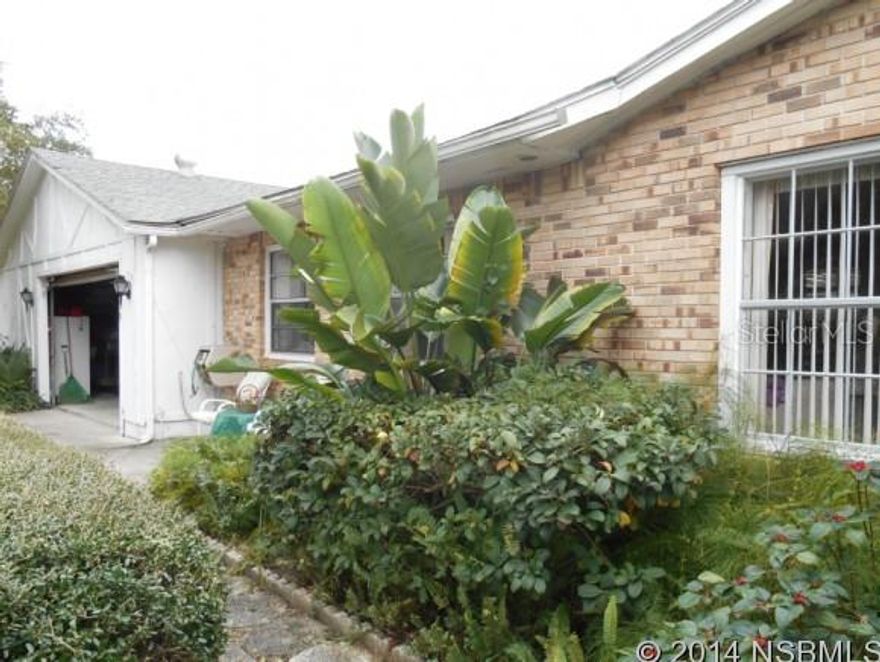 SOME FURNISHINGS INCLUDED   GO SHOWLARGE AND SPACIOUS HOME WITH LOTS OF WATERFRONTAGE. JUST A SHORT DISTANCE TO THE INTRACOASTAL WATERWAY IN A GREAT CUL-DE-SAC COMMUNITY. NEARLY NEW ARCHITECTURAL ROOF AND THIS HIGHLY MAINTAINED PROPERTY MAKE IT A GREAT OPPORTUNITY TO OWN WATERFRONT PROPERTY. THIS COULD BE A 4 BEDROOM HOME. THE  MASTER BEDROOM  IS LOCATED ON MAIN FLOOR WITH BEAUTIFUL WALK-OUT BALCONY. THE SECOND BEDROOM IS ALSO ON THE FIRST FLOOR AND THE MAIN FLOOR FAMILY ROOM COULD BE A 4TH BEDROOM. THE DOWNSTAIRS IS A WALK-OUT BUILT LIKE A BUNKER AND INCLUDES A LARGE FAMILY ROOM WITH COQUINA ROCK WALL AND WOOD BURNING STOVE. THE DOWNSTAIRS FAMILY ROOM HAS LOTS OF WINDOWS AND A BALCONY AND DECK TO LOOK OUT OVER THE DEEP WATER CANAL. THE LARGE EAT-IN KITCHEN  IS NEXT TO THE OVERSIZED INSIDE LAUNDRY ROOM. THERE IS ALSO AN OVERSIZED GARAGE  ON AN OVER SIZED LOT SO PLENTY OF ROOM FOR PARKING FOR AN RV. THIS VERY LARGE HOME GIVES YOU AMPLE VIEWS OF THE WATER AND AMPLE SPACE FOR ENTERTAINING LOTS OF FAMILY AND FRIENDS. THE LARGE COVERED PATIO PLUS LARGE BOAT HOUSE ARE GREAT FOR OUTDOOR LIVING  AND MAINTAINING YOUR WATER CRAFT. THE BOATHOUSE INCLUDES A BOAT LIFT AND A FISH CLEANING  STATION MAKING CLEANUP AFTER A DAY OF FISHING A BREEZE. THE 100 FOOT DOCK AND CONCRETE SEAWALL GIVES YOU PLENTY OF ROOM FOR MORE THAN TWO BOATS. DON'T MISS THIS GREAT DEAL FOR WATERFRONT PROPERTY. ;Water: City