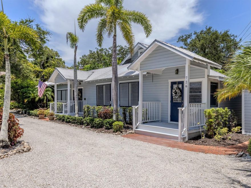 The historic Eagle Point Club in Venice is an exclusive waterfront community located within the privacy of mature foliage on the east, with Roberts Bay and the Intracoastal Waterway on all other sides. The only one of its kind, it was a creation circa 1910 by Bertha Palmer, famed figure in the early development of Sarasota County's Gulf, Bay and Waterfront lands. Eagle Point is a hidden gem, still mostly unknown and unseen by the crowds. Consisting of 24 acres of just 50 homes, 10 are original structures, listed on the National Register of Historic Places. The history is rich, but the focus today is on the pristine residence at 726 Eagle Point Dr.  Situated on over 1/3 of an acre, the 1920-built home is move-in ready for the next lucky owners to fall in love with. Updates have been thoughtfully accomplished including the luxury kitchen and baths that are designed to seamlessly maintain the historic ambiance. High ceiling above, original heart of pine flooring below, shaded porches on 3 sides continue the ambiance. Updates in recent times include a perfectly-sized pool, heated and caged, that create outdoor living area of approx. 42X63, built in 2014.  The beautifully designed free-standing 2+ car garage and storage building, built in 2011, is as handsome as it is functional. The amazing bonus amenity is the vintage clubhouse that includes guest rooms on the 2nd floor PLUS the free-standing 3-bedroom guest house next door, both of which may be reserved for visiting guests of homeowners. For those seeking a highly desired and unique Florida home, be sure to make an appointment to view this one-of-its-kind property.