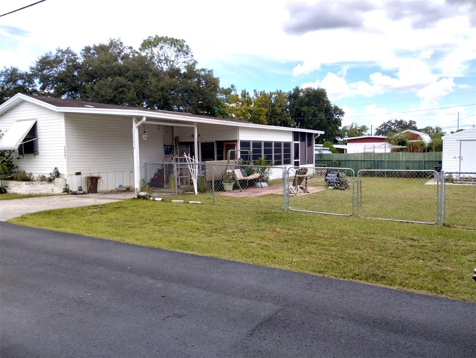 $450/Year HOA (Includes Water!) – Affordable 55+ Florida Living
Stop the search—this is the one! This 2004 singlewide in a welcoming 55+ community delivers unbeatable value with a $450 annual HOA fee, including water.
Step inside to find 2 bedrooms, 2 full baths, inside laundry, and a partially furnished interior ready for move-in. Stay comfortable year-round with a brand-new central heat & air system (2024).
Outside, you’ll love the oversized chain-link fenced yard—ideal for pets, gardening, or just enjoying the Florida sunshine. A storage shed adds extra space for tools and toys.
All this in a prime location, just minutes from shopping, dining, and medical facilities, with a bus route nearby for convenience.
Whether you’re looking for a seasonal getaway or a year-round residence, this home combines affordability, comfort, and convenience like no other. Don’t wait—homes like this move fast!