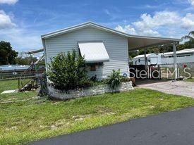 Great Florida Living in small 55+ park. Lovely 2004, 2 bedroom 2 bath singlewide home on fenced lot that you own, no lot rent. AC is newer. HOA fees are $450 a year and includes water. Close to shopping, medical facilities, bus route and so much more. AC is new 2024. Background Check is required. No LLC or Corporation purchases allowed. No leasing.