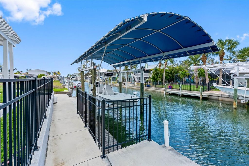 Photo of 9211 Lake Drive, Englewood, FL 34224 (MLS # TB8484499)