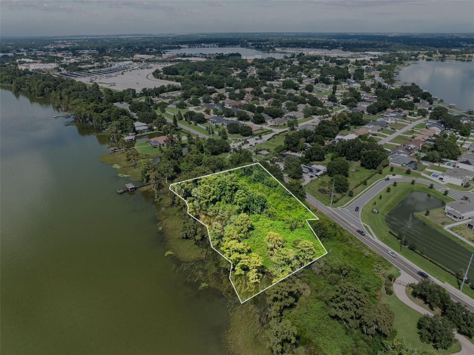 Discover the perfect canvas for your waterfront dreams with this stunning vacant lakefront lot. Nestled along the serene shores of Lake Eloise, this 2.45 acre parcel offers panoramic water views, direct lake access, and the peaceful privacy of nature all around. Whether you're envisioning a potential custom-built home, cozy cabin, or weekend getaway, this property provides the ideal foundation.
Enjoy swimming, fishing, kayaking, and breathtaking sunsets right from your backyard. Located in a great area of Winter Haven close to Legoland, shopping and restaurants.
Don’t miss this rare opportunity to own a slice of waterfront paradise on the beautiful chain of lakes in Winter Haven.