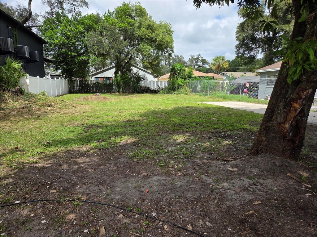 Photo of 2406 Dr Martin Luther King Jr Boulevard #N/A, Tampa, FL 33610 (MLS # O6449876)