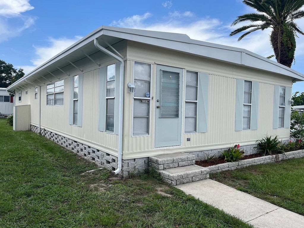 Photo of 15435 Lakeshore Villas Street, Tampa, FL 33613 (MLS # O6342926)