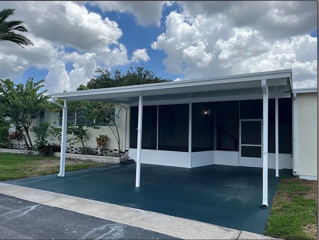 Photo of 15435 Lakeshore Villas Street, Tampa, FL 33613 (MLS # O6342926)