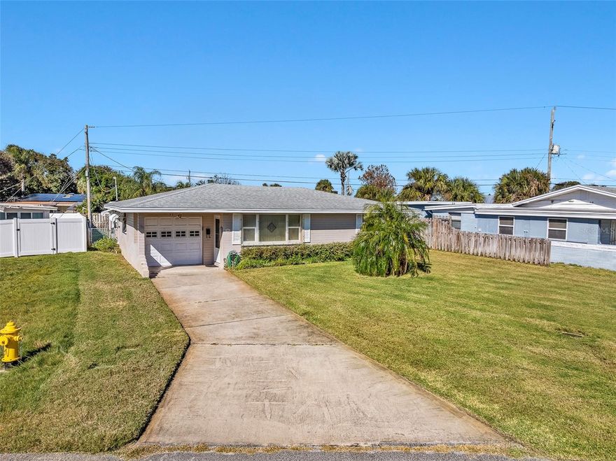 Welcome to this charming  beachside bungalow, ideally situated walking distance  from both the Atlantic Ocean and the Halifax River in highly desirable Ormond-by-the-Sea. This well-maintained 2-bedroom, 1-bath home with a 1-car garage offers the perfect blend of comfort, character, and convenience. Enjoy walking distance to Tom Renick Beach Park, Publix,  local restaurants, shopping, and all the coastal amenities this vibrant community provides. Inside, the home features an updated bathroom, spacious bedrooms , window blinds, ceiling fans,  and a separate inside laundry room. Major updates include a 2019 roof and newer windows. Relax in the enclosed Florida room—complete with a separate shower area—or unwind in the fully fenced backyard with an additional storage room off the patio. Move-in ready and perfectly located, this home invites you to enjoy the best of Florida beachside living.