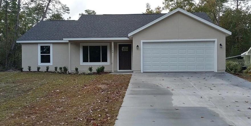 Welcome to 15749 SW 55th Avenue Rd, nestled in the sought-after Marion Oaks subdivision. This well-maintained single-story home offers 3 bedrooms and 2 bathrooms with a bright, open-concept kitchen, living, and dining area perfect for both everyday living and entertaining. The kitchen features a convenient breakfast bar and stainless steel appliances, including a refrigerator, microwave, dishwasher, and stove. Sliding glass doors lead to the rear of the home, providing easy access to the backyard.
The spacious primary suite includes a walk-in closet and a private ensuite bathroom with a dual vanity, walk-in shower, and separate toilet. Two additional bedrooms are complemented by a shared family bathroom complete with a bathtub and overhead shower.
Tile flooring runs throughout the entire home, and each room is equipped with overhead ceiling fans for added comfort. A dedicated laundry room is also included (washer and dryer not provided).
Outside, the property offers a long driveway, a two-car garage, and a generously sized yard, providing ample space for parking, storage, or outdoor enjoyment.