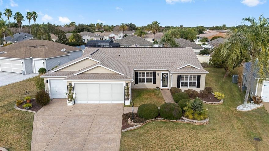 1647 Scotch Pine Way: The Ultimate Retreat for Fun, Relaxation, and Style -The Villages is all about entertaining and being in a great location.  Conveniently located between the “6’s” and a short hop to golf, rec centers,and plenty of shopping on Hwy 466A hits this target!  This open concept, split bedroom expanded Amarillo is a real Jewel. Here is what makes this home special: Corner Lot, Wide Expansive Driveway with Golf Cart Garage, Raised Wall Landscaping, Extended Living Room, Quartz Center Island and Custom Backsplash in the Updated Kitchen, Glass Enclosed Lanai with A/C Vent, an Amazing Outdoor Kitchen with plenty of seating. A large pergola will shade you from the Florida sun! All this on a wide private lot with a distant wall behind it. There is even plenty of room for a pool. Inside the additional updates include Luxury Plank flooring throughout the home, an abundance of crown molding, plantation shutters, beautiful feature walls in the primary bedroom and dining room, plus a cabinet pantry with pull-outs,. A spacious primary bedroom with an updated bath provides you with your own private sanctuary. Roof 2024, Water Heater 2025, Newer Stainless Kitchen appliances are all included! Low Bond Balance- Tax line includes Bond Payment and No Homestead Exemption. Make this Home Your Ultimate Retreat Space for You!