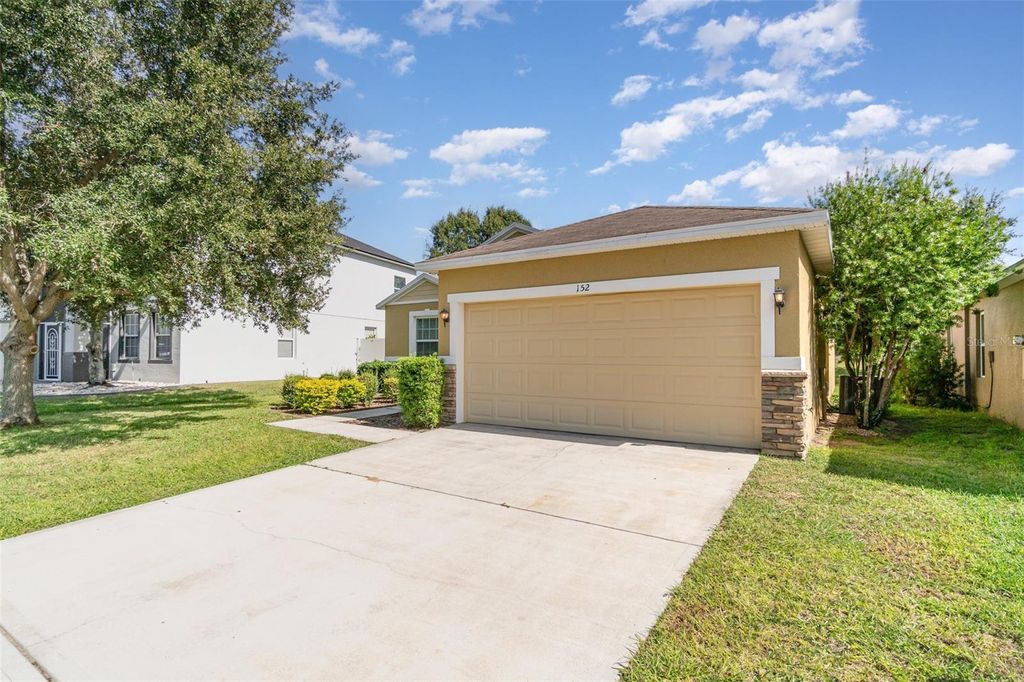 Photo of 152 Prairie Falcon Drive, Groveland, FL 34736 (MLS # O6354043)
