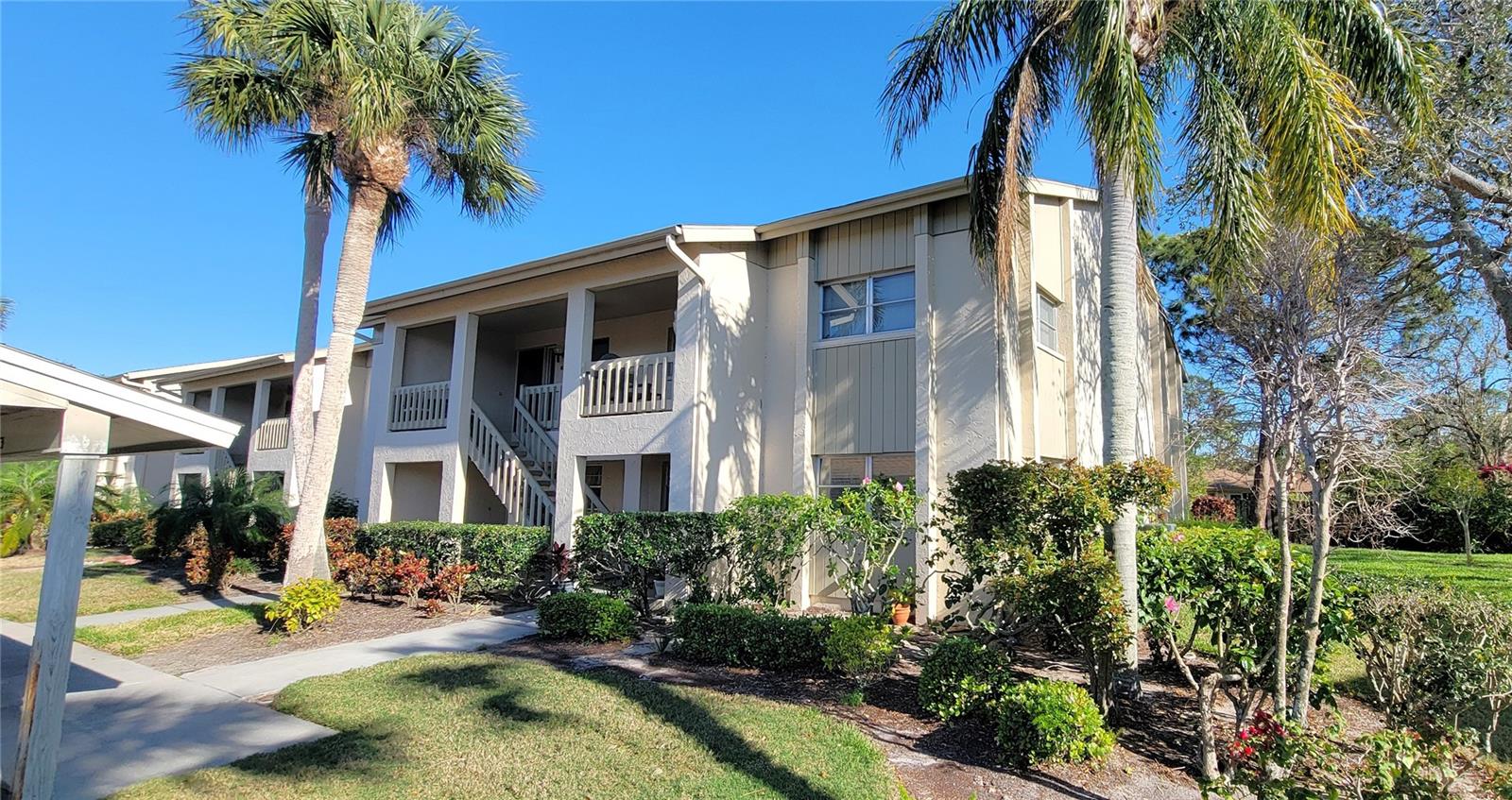 Welcome to this meticulous and beautifully updated 2 bedroom 2 bathroom 2nd floor condominium which features a beautiful new neutral porcelain tile floor throughout, all new lighting, all new ceiling fans, and new receptacles. The upgraded kitchen includes new granite countertops and all newer stainless-steel appliances. This light and bright condo has impact windows throughout. The primary bathroom was completely remodeled and includes 2 separate vanities and walk in shower and gigantic walk-in closet. The second bathroom has a beautiful new granite countertop. The new pocket door makes the second bedroom and bath a guest suite when needed. This condo even has a large laundry room allowing for extra inside storage. Take in the private natural view from the incorporated lanai providing more living space. Woodside Terrace, a community of 56 condo units, located in Gulf Gate is a 55+community. It is meticulously maintained with strong financials. Residents enjoy a beautiful community pool and clubhouse creating a wonderful place to socialize or just relax and take in the peaceful surroundings. This furnished condo has it all: upgrades, serene surroundings and a convenient location in Sarasota. This is only 1.75 miles to Siesta Key and walkable to shopping, restaurants, library and so much more! Don’t miss this opportunity to make this exceptional property your new home. Call today to schedule a private showing and start living the lifestyle you deserve.