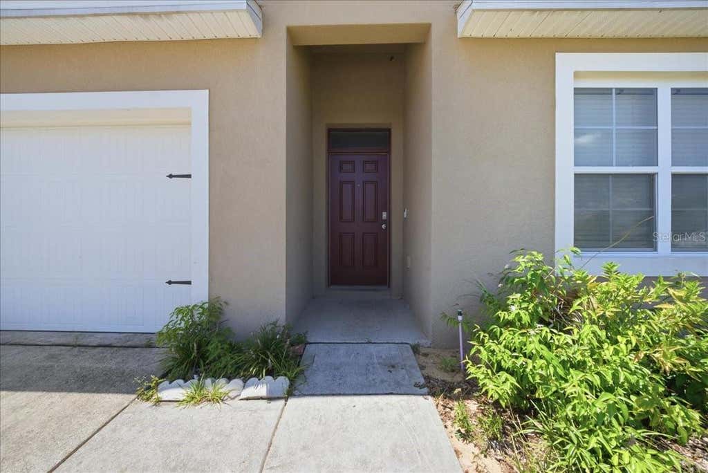 Photo of 750 Lafayette Lane, Haines City, FL 33844 (MLS # L4963259)