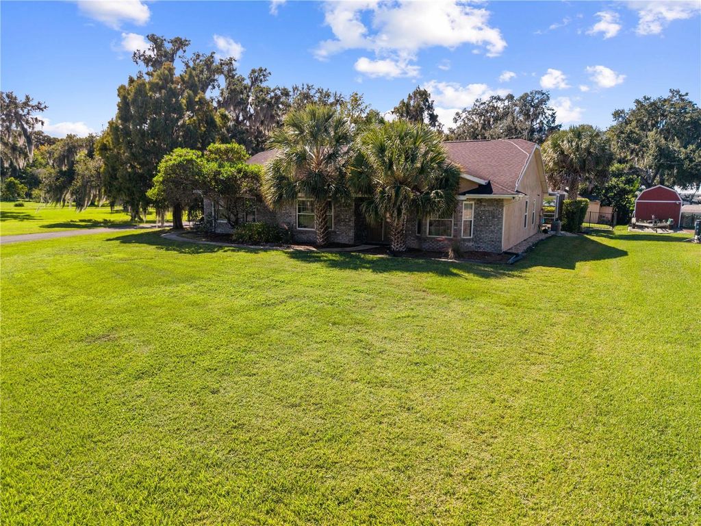 Photo of 860 Shore Drive, Kissimmee, FL 34744 (MLS # O6359612)