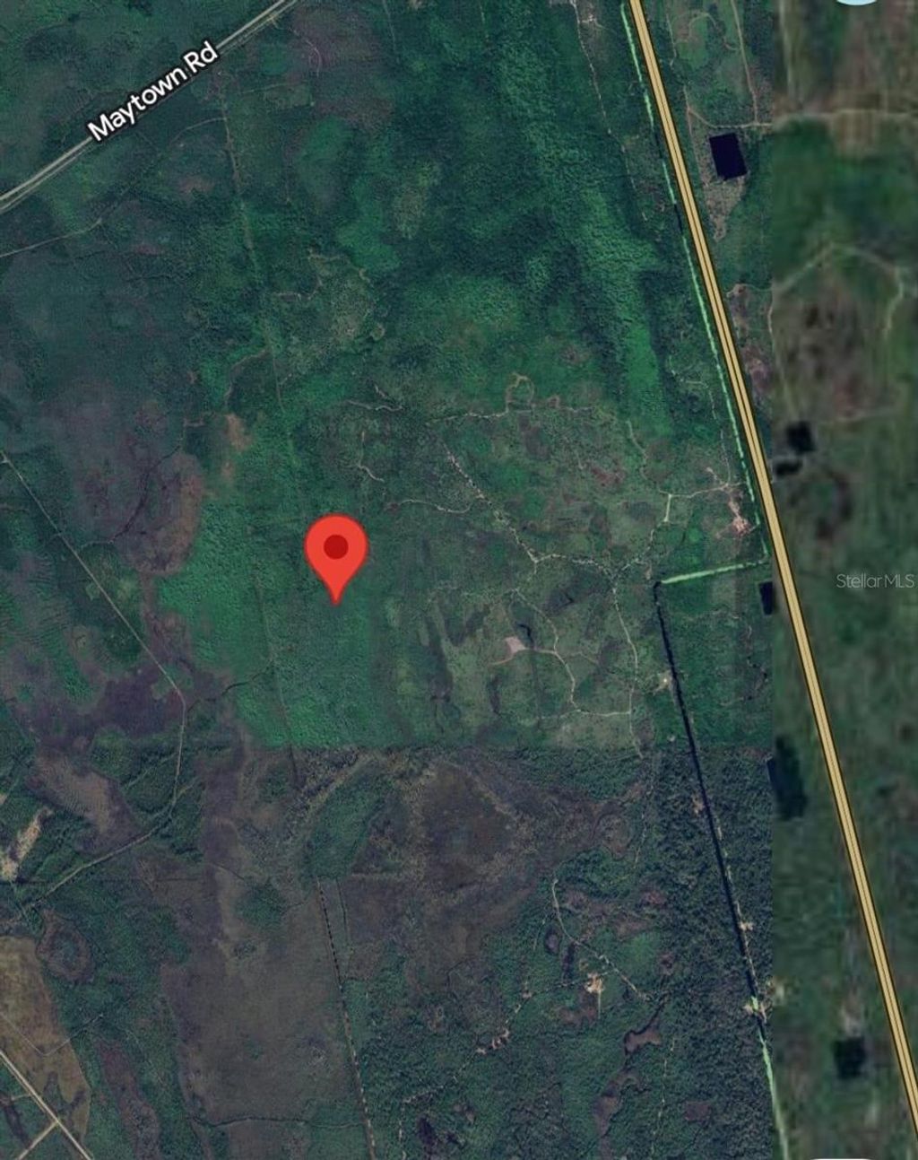 Photo of 0 State Hwy 9, Oak Hill, FL 32759 (MLS # O6353509)