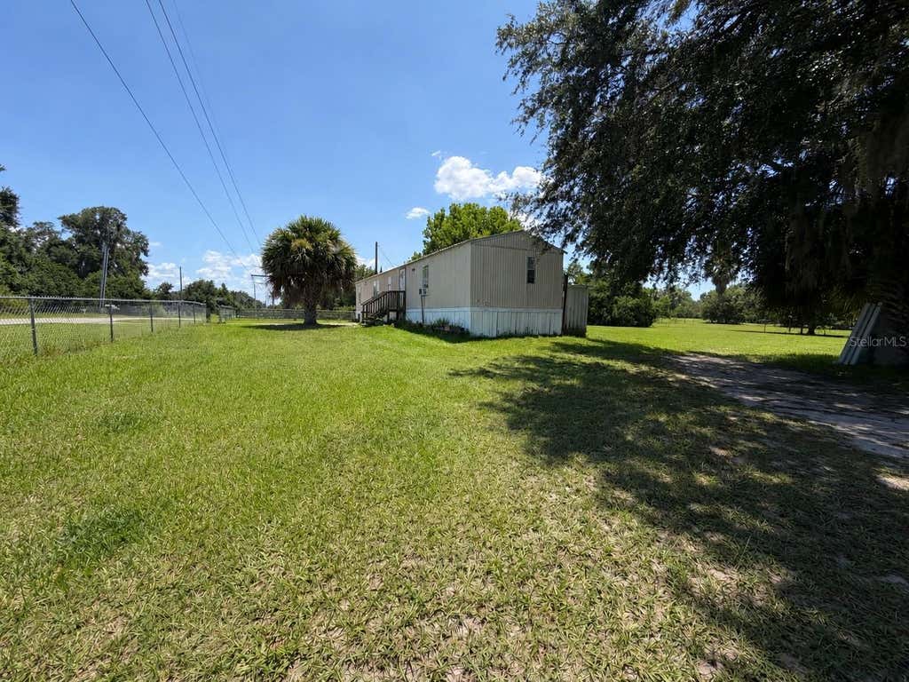 Photo of 1218 Cr 416n, Lake Panasoffkee, FL 33538 (MLS # TB8533351)