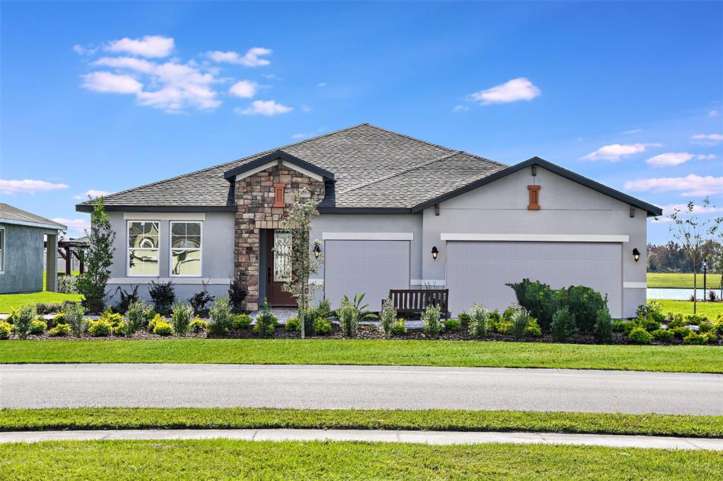 READY NOW! PREVIOUS MODEL HOME This Energy Star Certified home has 4-bedrooms, 3-baths, a covered lanai with extended patio, 3-car garage and is located on a pond front homesite. Kitchen is open to dining & great room and has 42" cabinets with crown molding, quartz countertops, stainless Whirlpool® appliances, tile backsplash, pendant lighting, and walk-in pantry. Beautiful laminate wood flooring and crown molding adorns the main areas. Primary bedroom boasts a tray ceiling, large walk-in closet, dual vanity sinks with quartz counters, enlarged semi-frameless glass shower, linen closet, and privacy lavatory. This serene backyard is perfect for entertaining or relaxing with two ceiling fans, a firepit, views of the pond, and a paver lanai that extends out in to a patio. Located close to I-75, US 41, shops and dining. The Reserve at Pradera offers residents a resort-style pool with cabana, playground, splash pad, dog park, basketball courts and soccer fields and numerous walking and biking trails. Room Feature: Linen Closet In Bath (Primary Bedroom).