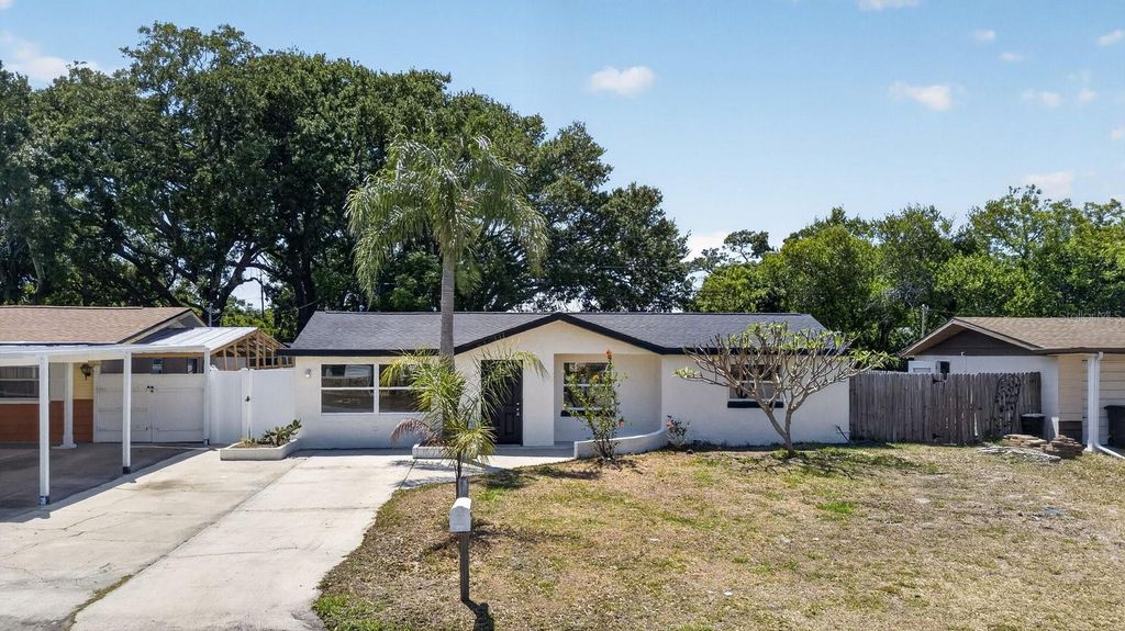 Photo of 3851 Saturn Drive, New Port Richey, FL 34652 (MLS # TB8504302)