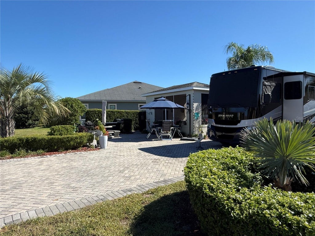 Photo of 794 Teaberry Trail, Polk City, FL 33868 (MLS # L4965838)