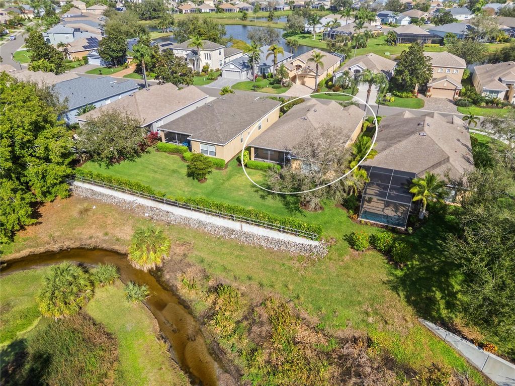 Photo of 3604 Summerwind Circle, Bradenton, FL 34209 (MLS # A4673746)