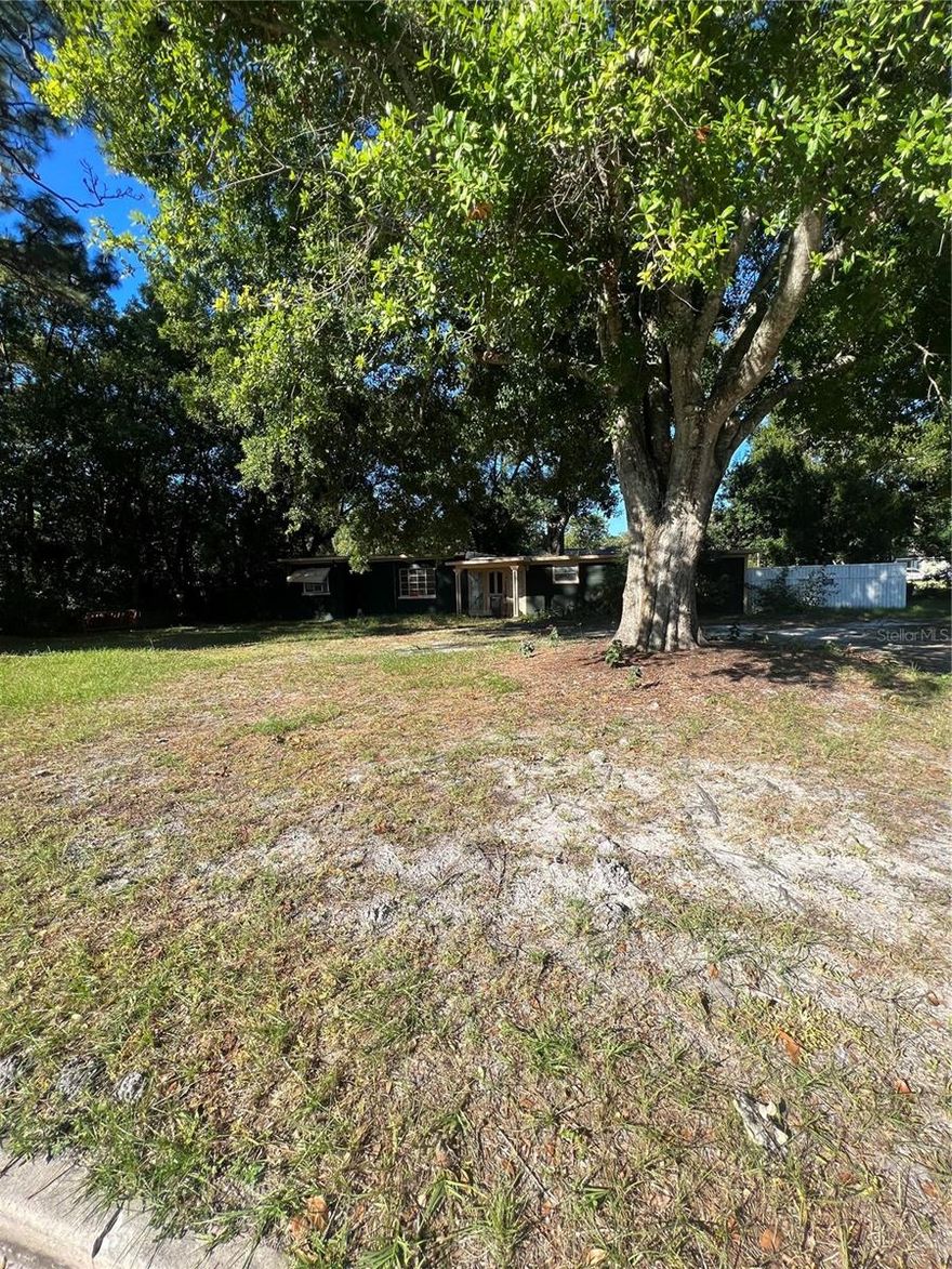 Great property to renovate and take advantage of the booming Sanford market.  Garage was enclosed for 3rd bedroom and bonus room - not included in Sq Ft under air. Large corner lot with pole barn and beautiful oak trees.  No HOA restrictions - enormous potential! Convenient to downtown Historic Sanford, Lake Monroe and the 417 Expressway.