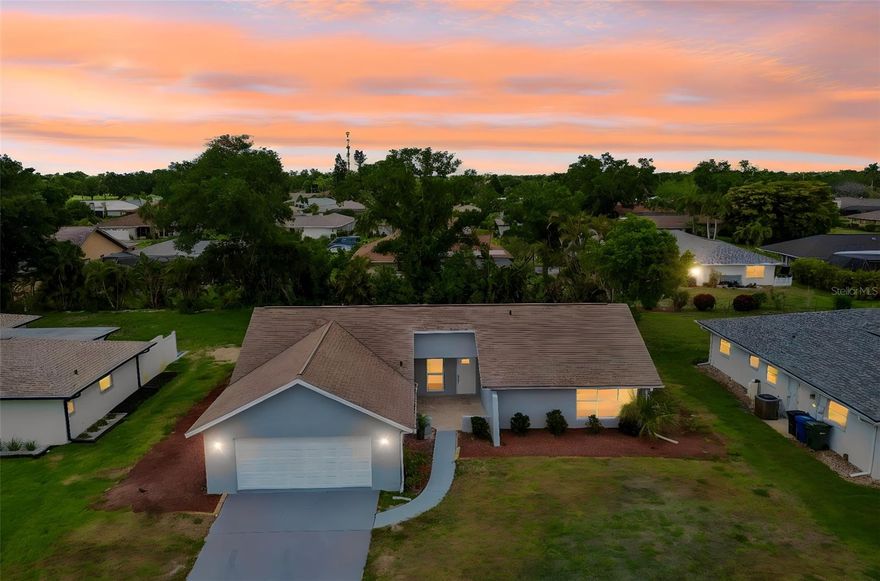 One or more photo(s) has been virtually staged. OWNER MOTIVATED | NO FLOOD INSURANCE REQUIRED | NO CDD  | LOW HOA. Beautifully renovated 4-BEDROOM, 2-BATH home offering just over 1,800 SQ FT of living space in the VENICE GARDENS SUBDIVISION, tucked in a QUIET RESIDENTIAL NEIGHBORHOOD and LOCATED IN THE HEART OF JACARANDA WEST NEAR PLANTATION GOLF & COUNTRY CLUB. This MOVE-IN READY property features NEW INTERIOR AND EXTERIOR PAINT, BRAND-NEW FLOORING THROUGHOUT, and a completely updated kitchen with a LARGE WATERFALL ISLAND, modern cabinetry, and stylish finishes. Both bathrooms have been FULLY RENOVATED with contemporary design elements. The spacious layout offers comfortable living areas and flexibility for everyday living or entertaining. The community offers CONVENIENT ACCESS TO US-41 and is just a SHORT DRIVE TO VENICE’S FAMED BEACHES, GOLF COURSES, PARKS, SHOPPING, AND DINING. Zoned for A-RATED SARASOTA COUNTY SCHOOLS.