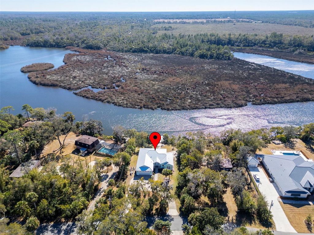 Photo of 825 Hewitt Drive, Port Orange, FL 32127 (MLS # O6381610)