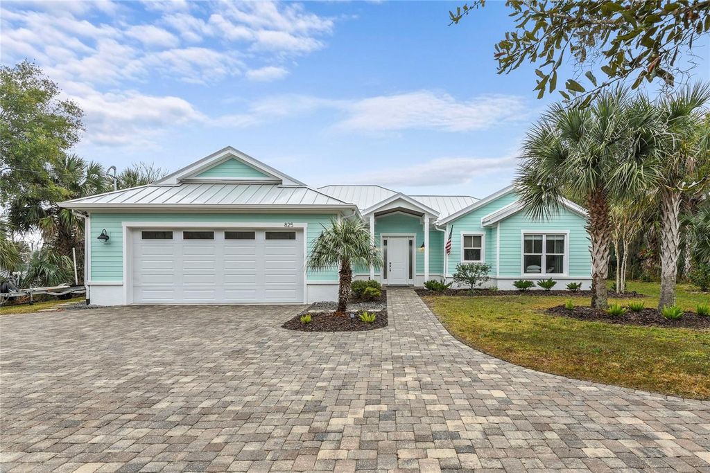 Photo of 825 Hewitt Drive, Port Orange, FL 32127 (MLS # O6381610)