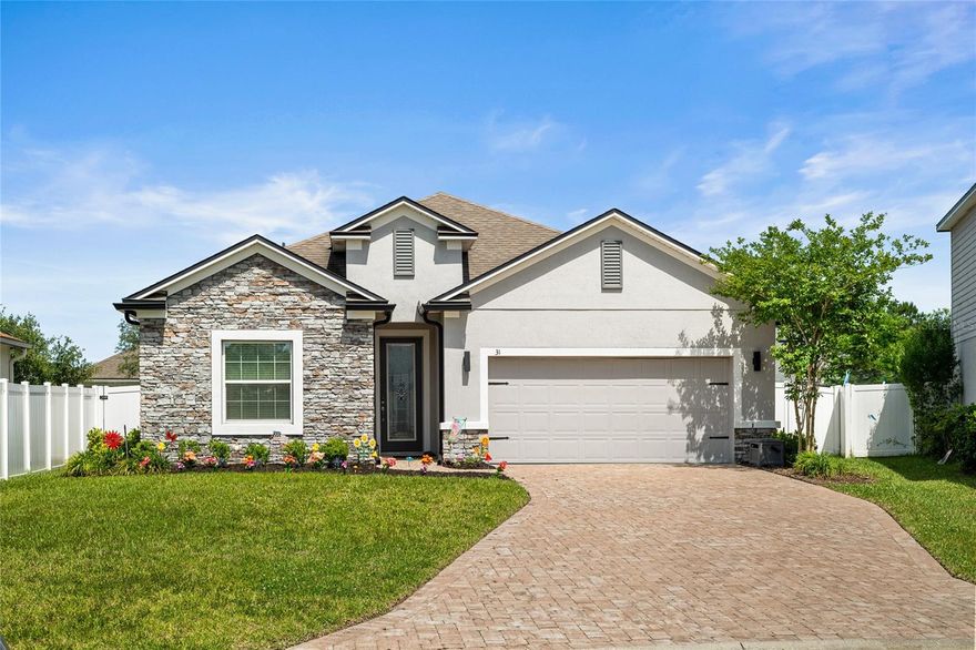 For Your Consideration: A beautifully upgraded, better-than-new home in the sought-after community of Treaty Oaks, where resort-style living meets everyday convenience. Perfectly positioned on a quiet cul-de-sac just minutes from historic downtown St. Augustine, area beaches, and I-95, this impressive one-level concrete block Maronda-built home offers 4 bedrooms, 2 baths, and is located within the highly regarded St. Johns County School District.
Inside, the open-concept design offers expansive living space centered around a stunning chef's kitchen featuring a large entertaining island, granite countertops, white shaker cabinetry, designer glass tile backsplash, stainless steel GE appliances, and a coveted double wall oven. Tray ceilings, crown molding, and rich engineered hardwood flooring elevate the home's style and warmth while creating a polished custom feel rarely found at this price point.
The spacious primary suite is designed as a true retreat with split granite vanities, dual sinks, a luxurious soaking tub, and an oversized walk-in shower built for two. Secondary bedrooms are comfortably carpeted, while both bathrooms continue the upscale finishes with granite countertops and modern detailing.
Step outside to enjoy the screened and covered lanai overlooking the fully fenced backyard—the perfect setting for morning coffee, evening gatherings, or simply relaxing in privacy. A custom paver driveway adds even more curb appeal to this already standout property.
Residents of Treaty Oaks enjoy access to exceptional neighborhood amenities including a resort-style pool, fitness center, and clubhouse, making every day feel like a vacation. There is no CDD fee and the HOA is less than $65 per month.
Offered at $454,000
