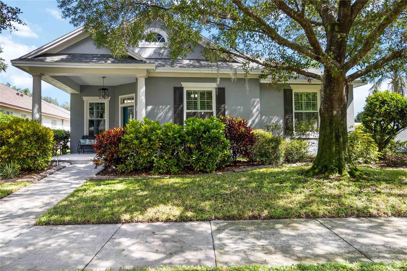 Discover this exquisite three-bedroom, two-bathroom POOL home, offering a blend of comfort and style. **New Roof-New Water Heater-New Windows-New Water Softener and Whole Home Water Filter-New Pool ** The home features LVP and tile providing a seamless flow throughout with NO carpet. Upon entry, you're greeted by a Flex room with double doors, that could be used as a dedicated office space that is perfect for remote work or a quiet study. The home's layout is centered around an open-concept great room and kitchen, creating a perfect hub for daily life and entertaining. The kitchen features quartz countertops, a large island with bar seating, ample cabinet and counter space, a stylish tile backsplash, updated stainless steel appliances, and a convenient pantry. The primary suite is a true retreat, complete with a trey ceiling and an ensuite bathroom that boasts a tiled shower, dual vanity, and a relaxing Jacuzzi whirlpool tub. The secondary bedrooms are also generously sized, sharing a bathroom with a double vanity. A dedicated laundry room with built-in cabinets adds to the home's functionality. Step outside to your private oasis—a covered patio overlooks a sparkling, screened-in salt-water pool with a solar heater, all within a fenced backyard for privacy. This home offers low-maintenance living in the highly sought-after Lakes of Windermere community. Residents can enjoy an array of amenities, including multiple parks, playgrounds, a pavilion, a community pool, tennis, volleyball, and basketball courts, and a fishing pier. This home is meticulously cared for and move-in ready. It's convenient location provides easy access to highways, shopping, restaurants, Winter Garden Village, and Disney. This property is a must-see!