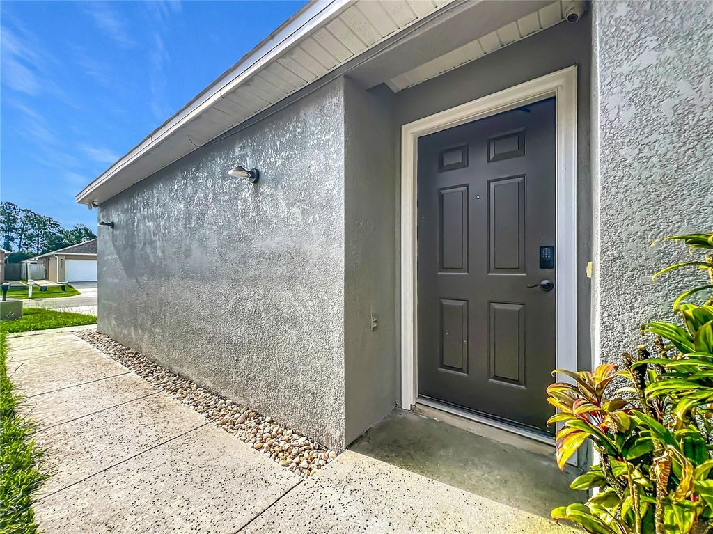 Photo of 13011 Odyssey Lake Way, Orlando, FL 32826 (MLS # O6423710)