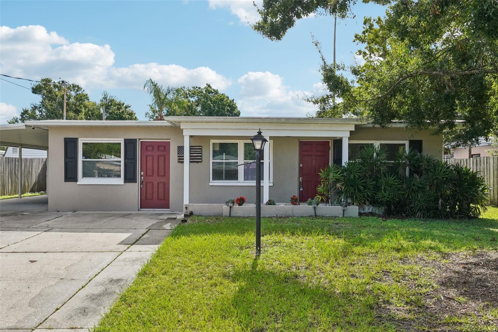 Welcome home to the highly sought-after Manhattan Manor neighborhood! This stunning 3-bedroom, 2-bathroom residence offers an unbeatable location near everything Tampa has to offer, and it comes with an incredible advantage: an assumable FHA loan with an exceptionally low 2.86% interest rate. As you enter this meticulously maintained home and discover a spacious, inviting floor plan. The living area is flooded with natural light, making it the perfect spot for relaxing evenings or entertaining guests. The kitchen is a chef's dream, featuring modern stainless steel appliances, including a brand-new 2025 GE dishwasher, stylish cabinetry, and ample counter space. Enjoy casual meals at the breakfast bar or host formal dinners in the adjacent dining area. The primary bedroom is a tranquil retreat, complete with a fully remodeled high-end ensuite bathroom that boasts a custom glass shower enclosure and beautiful marble floors and walls. Two additional bedrooms provide flexibility for guests, a home office or gym. The weather-resistant car port/awning was just installed, and has been hurricane tested, a $15,000 upgrade with an 8-year warranty. The backyard is fully fenced private oasis, has six palm trees, and is large enough for a future pool. A large shed provides extra storage for all your yard and home equipment. The double-wide driveway ensures plenty of parking. This home is as secure as it is beautiful. A 2023 roof provides peace of mind, and the property experienced no flooding or damage from recent hurricanes. The assumable flood policy, priced at an affordable rate of approximately $1,700 per year, is paid through the beginning of next year. Located on a quiet street with no through traffic, you'll be just minutes from Tampa International Airport, Downtown Tampa, MacDill Air Force Base, and the beautiful Gulf Coast beaches. Enjoy fast interstate access to Downtown St. Pete and the beaches. You're also down the block from the new Britton Plaza development and just minutes from Adum Magnet School, Westshore Marina, and Hula Bay and Salt Shack. Don't miss this rare opportunity to own a piece of Manhattan Manor with an unbeatable loan rate. This area is prime for investing as well with no minimum rental restrictions, if you're looking for an Air Bnb. Schedule your showing today and experience the best of South Tampa living!