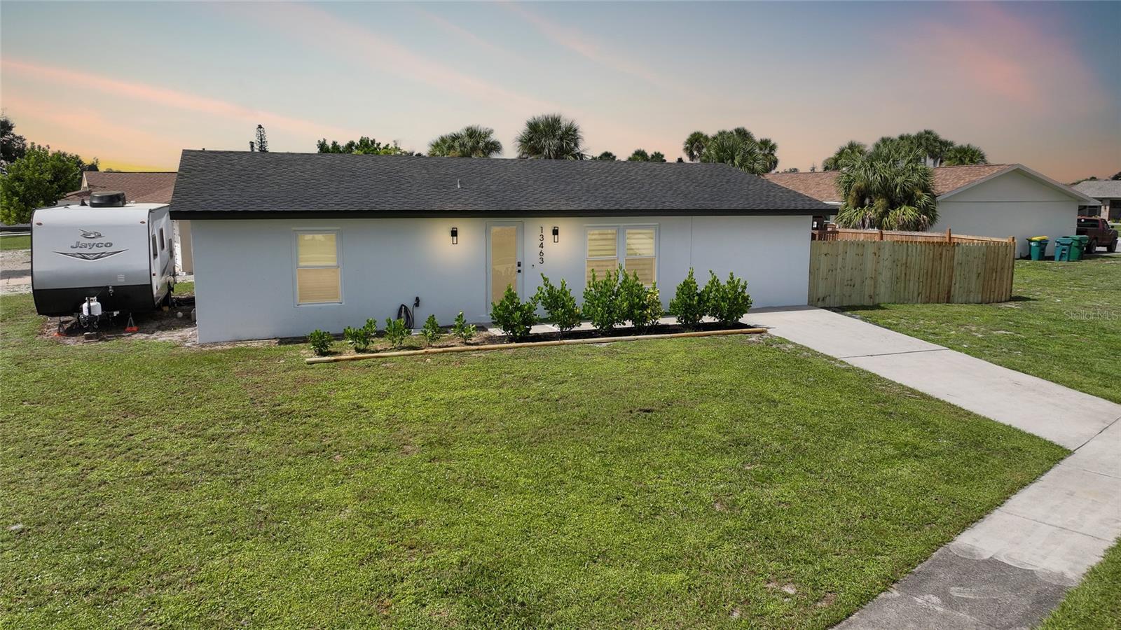 Welcome to 13463 Longwood Avenue, a beautifully reimagined home in the desirable Gardens of Gulf Cove community in Port Charlotte, Florida. Fully remodeled in 2025, this 3-bedroom, 2-bathroom residence offers 1,573 square feet of stylish and functional living space. From top to bottom, the home has been thoughtfully updated with high-end finishes that go beyond what you'll find in many new construction homes.
The transformation includes a brand-new roof, new AC system, new hot water heater, and new impact windows and doors, providing both peace of mind and energy efficiency. The electrical panel and wiring have been completely replaced, along with new plumbing throughout the home. Inside, a modern contemporary kitchen steals the spotlight, featuring quartz countertops, brand-new appliances, and sleek cabinetry—all complemented by tile flooring that extends throughout every room.
The open floor plan is accentuated by LED accent lighting that adds a touch of modern elegance to the living spaces. Both bathrooms have been tastefully updated with contemporary finishes, delivering a spa-like feel. Outside, a fully fenced yard with privacy fencing offers a secure and serene outdoor space, complete with an 8x10 storage shed. Being situated on a corner lot provides a bit of extra yard space, ideal for gardening, entertaining, or simply enjoying Florida’s sunshine.
As part of the Gardens of Gulf Cove, homeowners enjoy access to a wide array of amenities, including two swimming pools (one of which is heated), a clubhouse with a fitness center, as well as tennis, pickleball, shuffleboard, and basketball courts. The community is walkable and well-maintained, with sidewalks and street lighting that make for a pleasant evening stroll.
The home’s location is just minutes from the Gulf beaches, the scenic Myakka River, and local favorites like Myakka State Park. Whether you're into boating, fishing, kayaking, or simply soaking in the natural beauty, this area offers something for everyone. A variety of local restaurants, boutique shops, entertainment options, and golf courses ensure you’re never far from fun and convenience.
13463 Longwood Avenue is more than just remodeled—it’s been elevated. With modern systems, designer-level finishes, and a vibrant, amenity-rich community, this home offers the best of Florida living. Don’t miss your chance to own a property that’s truly better than new. Schedule your private showing today