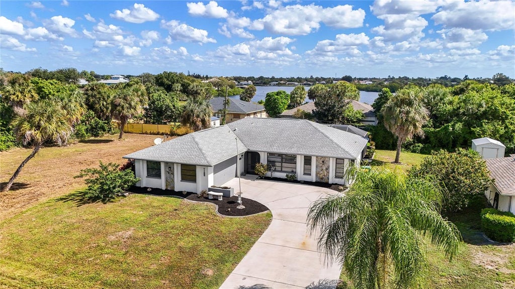 Photo of 167 Millport St, Port Charlotte, FL 33948 (MLS # A4710545)
