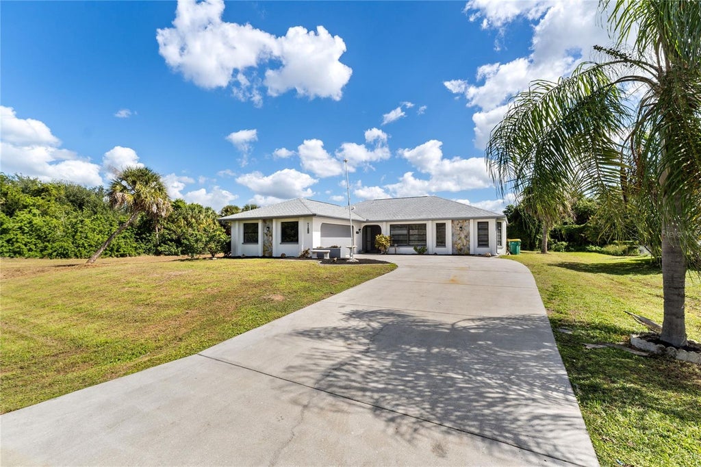 Photo of 167 Millport St, Port Charlotte, FL 33948 (MLS # A4710545)