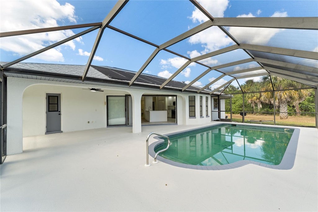 Photo of 167 Millport St, Port Charlotte, FL 33948 (MLS # A4710545)