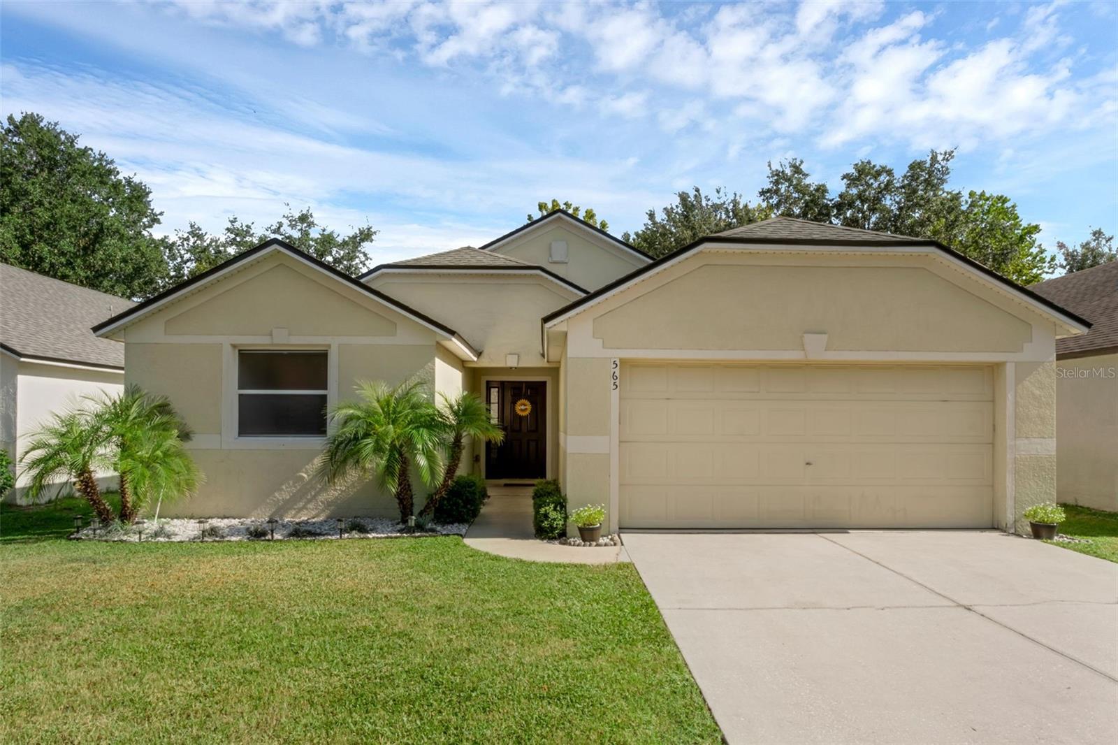 Experience comfortable living in this 1640 sq ft home with a well maintain yard and landscaping. This 3 bedroom, 2 bathroom residence boasts an inviting open floor plan, highlighted by a large kitchen and ample dining area perfect for entertaining. Enjoy the convenience of an inside utility room and a two-car garage. The master suite features a spacious walk-in closet, dual sinks, a separate garden tub, and a refreshing walk-in shower with a private water closet. Recent upgrades include a new roof (2021), new water heater (2023), and a brand-new HVAC system (2025) ensuring years of worry-free enjoyment. Located within a desirable community featuring a park with a playground and nearby dog park, this home offers an excellent lifestyle. Close proximity to shopping and easy access to I-4 make for a convenient commute. Don't miss this opportunity to make this beautiful house your new home!