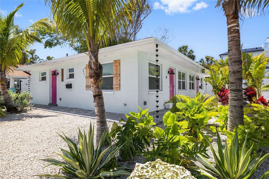 Welcome to "Pineapple Paradise" this luxury duplex is recently renovated and centrally located on Anna Maria Island with over $130k in rental revenue in 2025. This property underwent a full renovation in 2023 with full permits for new windows, electric, ac, and plumbing. This island retreat features a brand new heated saltwater pool and spa nestled among the palm trees with a secluded beach alley access. Each side features it's own kitchen, living and dining area. The gourmet kitchen in both units features quartz countertops, new shaker cabinets and stainless steel appliances. This home is being sold turn-key furnished. Property is currently being used as a vacation rental. Call today for your private showing!