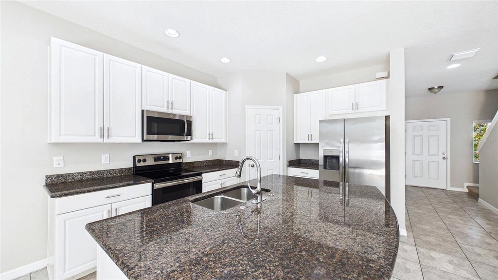 Photo of 7214 Grand Elm Drive, Riverview, FL 33578 (MLS # TB8515832)