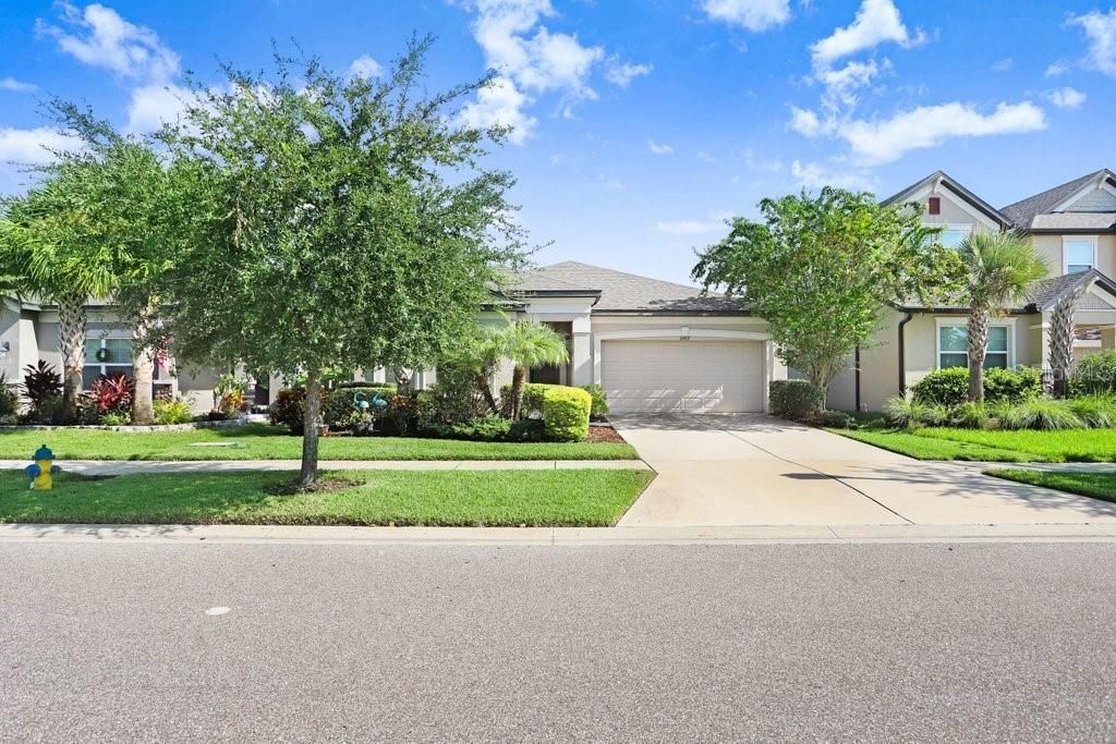 Photo of 6489 Dutton Drive, Wesley Chapel, FL 33545 (MLS # A4663798)