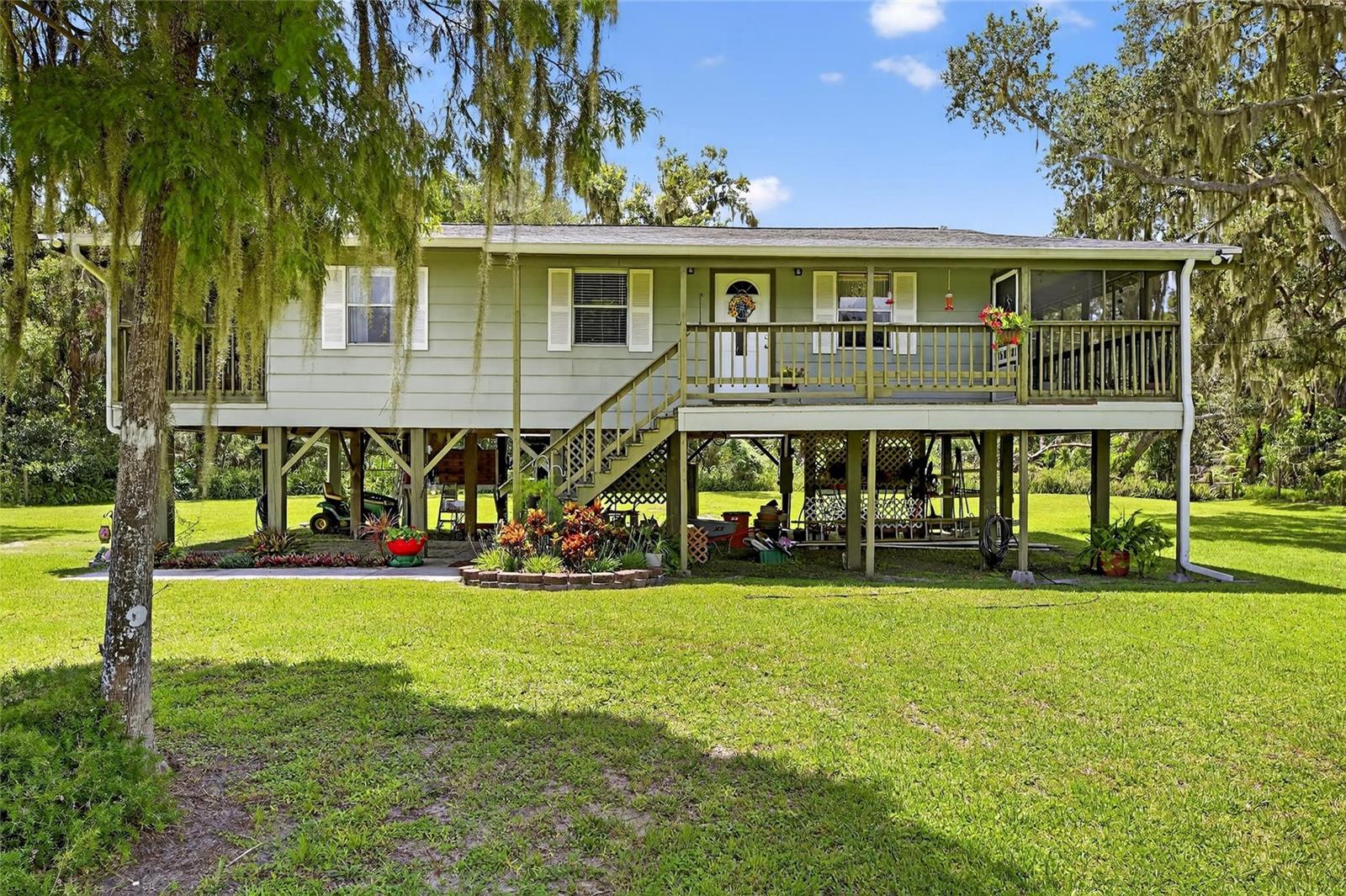 Charming 3-Bedroom Stilt Home on 2.5 Acres – No HOA, No CDD! Located in a USDA eligible area .
Escape the hustle and bustle with this unique 3-bedroom, 1-bath stilt home perfectly situated on 2.5 acres of serene land. Offering both privacy and space, this property provides endless possibilities—bring your RV, boat, or even start a garden or small farm.
The elevated stilt design not only adds character but also provides extra covered space underneath, perfect for storage, parking, or creating an outdoor entertainment area. Inside, you’ll find a cozy layout ready for your personal touches.
With no HOA and no CDD fees, you’ll have the freedom to truly enjoy your land your way. Whether you’re looking for a quiet homestead, investment opportunity, or weekend retreat, this property has incredible potential.
Don’t miss the chance to make this peaceful retreat your own!