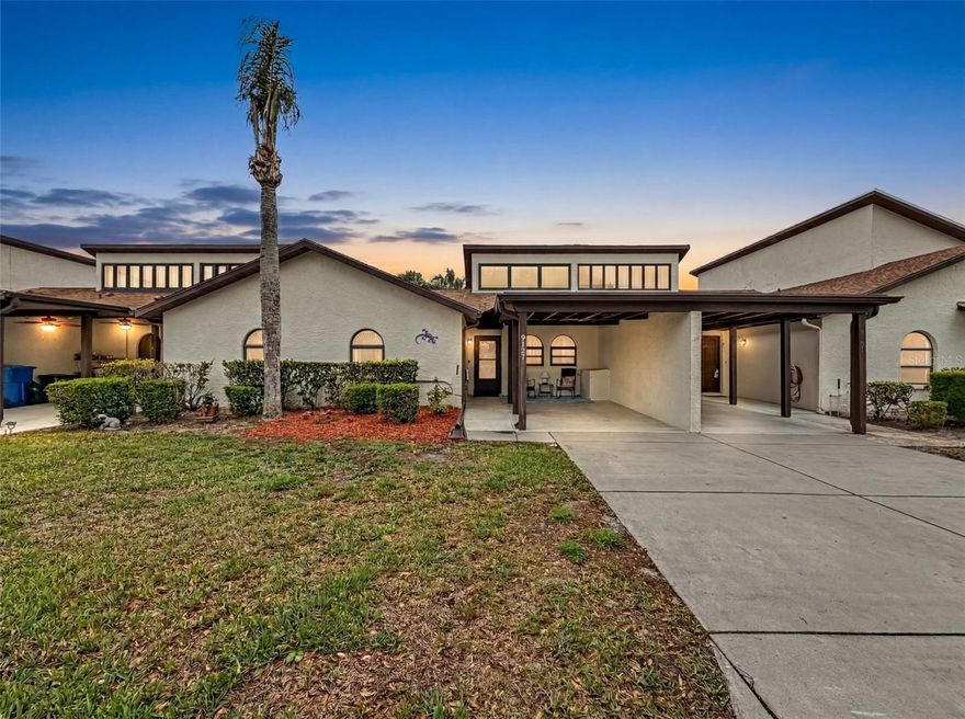 Lakefront living in Heather Sound--Private Dock and Extensive updates and upgrades! Nestled on a serene lakefront in the sought-after 55+ of the Heather Sound Community. This is a beautifully updated 2 bedroom, 2 bath + loft villa. This home invites you to embrace the ultimate Florida lifestyle. Enjoy mornings on your private dock or embrace the outstanding Florida sunsets. Step inside to find a spacious layout featuring a living room, dining area and an inviting kitchen complete with wood cabinetry and a full suite of updated stainless steel appliances (2020) including refrigerator, microwave, dishwasher & smooth-top range; tile flooring flows throughout the main spaces, Primary bedroom has newer carpet, while the guest bedroom has newer wood laminate flooring. Upstairs, a versatile loft with newer carpet provides additional living or guest space and includes a convenient Murphy bed--ideal for visiting family and friends. One of the home's standout features is the vinyl window enclosed porch with tile flooring, offering year round enjoyment and peaceful view of the lake. This villa is loaded with valuable updates including a new roof (2023), new A/C heat pump (2020), and new Andersen double pane windows upstairs and new Pella windows downstairs, enhancing energy efficiency and comfort. Additional conveniences include a stacked washer & dryer in a private closet and three televisions that convey with the home. Residents of Heather Sound enjoy access to a private village pool and the HOA covers exterior maintenance, irrigation and lawn care, including watering and pest control--allowing for truly low maintenance living. Whether you're seeking a full-time residence or a seasonal retreat, this lakefront villa offers a relaxed lifestyle in a welcoming community and designed for active adults. The Heather offers an optional executive style golf course for those who want to enjoy a round close to home.