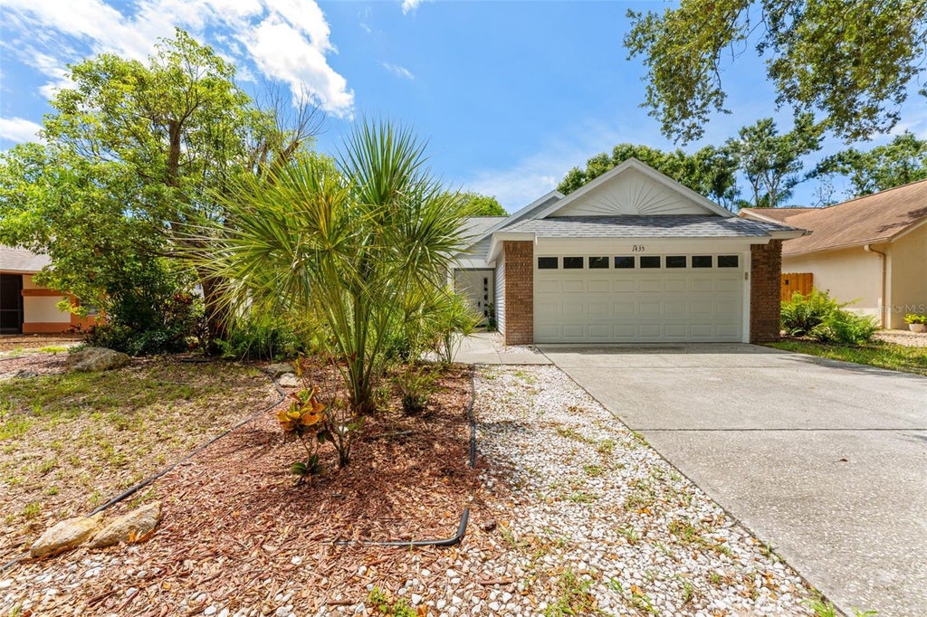 Photo of 1435 Club Drive, Tarpon Springs, FL 34689 (MLS # TB8550851)