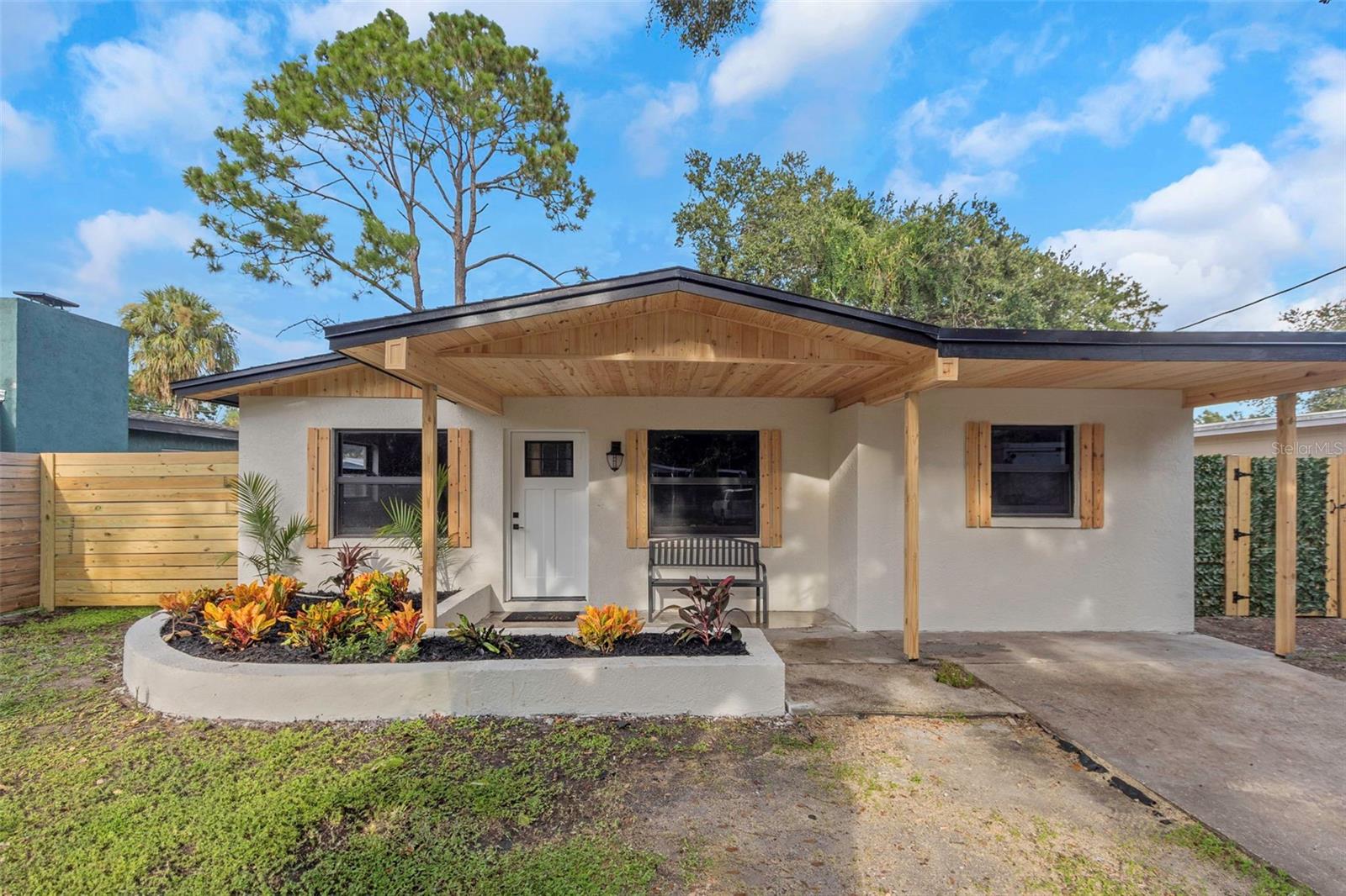 Discover modern comfort in this thoughtfully fully remodeled 4 Bedroom, 2 Bathroom 1,259sqft home that includes a walk-in pantry, located just 5 minutes north of MacDill Air Force Base, nestled in the desirable Port Tampa City/South Tampa corridor. This home features beautifully tiled bathrooms including a walk-in shower in the master bathroom, quartz countertops, a full suite of brand-new stainless-steel appliances, and a stylish coffee-bar island—ideal for entertaining or a morning latte station. These upgraded fixtures, designer finishes and luxury vinyl flooring throughout adds durability and ease of care for long term beauty. This South Tampa home means you’re close to shopping, dining and top-rated schools with quick access to both Gandy Blvd and the Selmon Expressway for easy commuting. Schedule your private showing today and make this upgraded, move-in-ready gem in Tampa your new home!