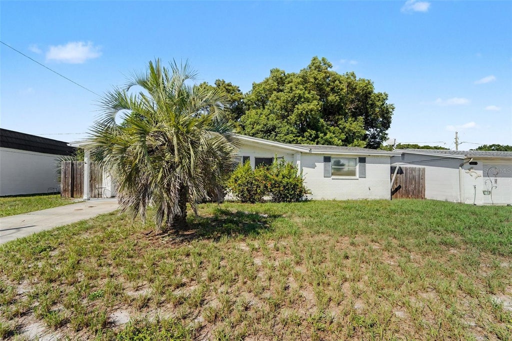 Photo of 5145 Manor Drive, New Port Richey, FL 34652 (MLS # TB8557506)