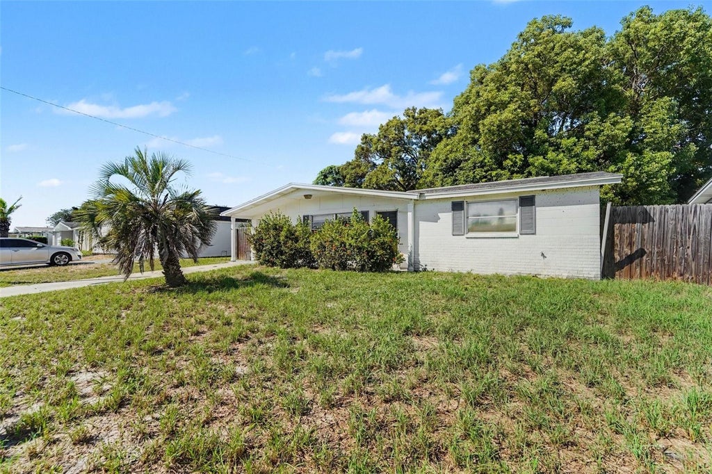 Photo of 5145 Manor Drive, New Port Richey, FL 34652 (MLS # TB8557506)