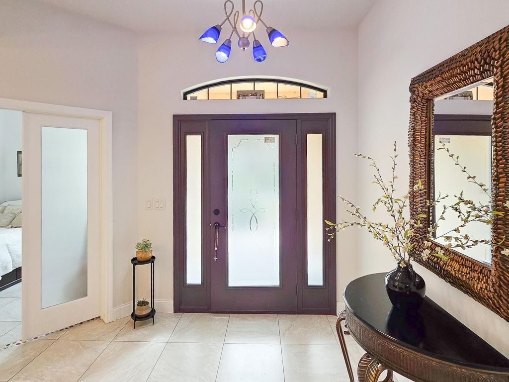Photo of 13 River Oaks Way, Palm Coast, FL 32137 (MLS # FC318592)