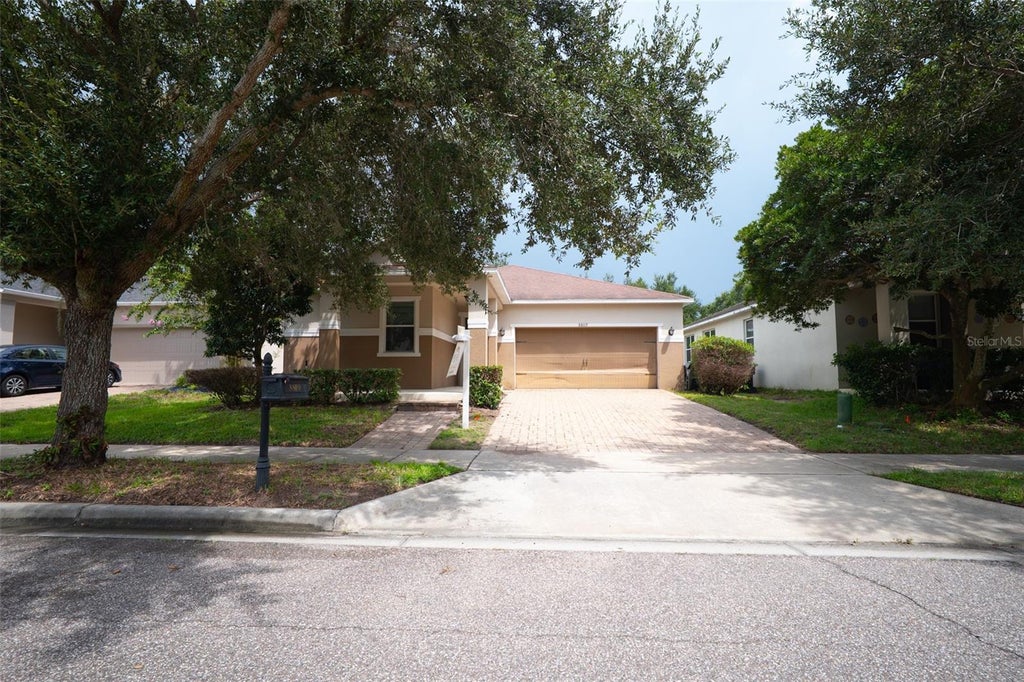 Photo of 8809 Arrabida Lane, Orlando, FL 32836 (MLS # O6445644)