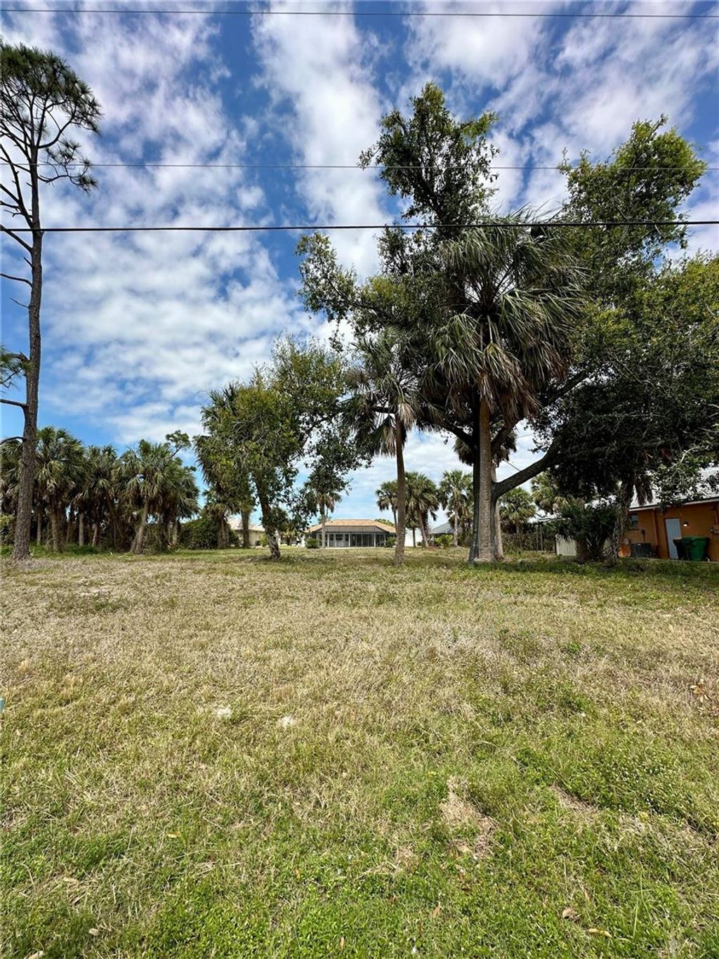 Photo of 45 Long Meadow Lane, Rotonda West, FL 33947 (MLS # C7506884)