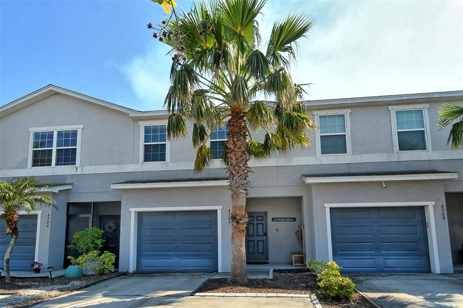 Now available as an Annual “turnkey” furnished” 3 bedroom, 2.5 bathroom, townhome located in Palmer Place/Artistry Community. Built in 2018, the homeowner has made several upgrades to the interior, which includes brand new kitchen cabinets, quartz counter tops, brand new stainless appliances, and luxury vinyl plank flooring throughout the downstairs living area, carpeted stairs and bedrooms. The beautiful open-plan kitchen and family room along with a laundry closet which has been opened up to give the feel of more space, spacious walk-in pantry, a half-bath, and large storage area under the stairs. Leading from the family rooms sliding glass doors is an enclosed and screened-in lanai overlooking a peaceful and serene lake, there is also a large storage room. As you head upstairs you will find the master bedroom with a spacious walk-in closet, en-suite bathroom with walk-in shower and dual sinks. Leading from the upstairs hallway are two large guest bedrooms and a guest bathroom with tub/shower combo. The 3rd bedroom is not furnished and can be used as an office or exercise room. There is a one-car garage and a 2-car driveway to allow for plenty of parking space. This community is ideally situated approximately 4 miles east of I-75, you are just 25 minutes from Florida's top-rated beaches, including Siesta Key and Lido Key, to name a few! A short drive to University Town Center and Mall, Benderson Park, and Downtown Sarasota, where you will find an abundance of of dining, shopping, and entertainment options. Rent includes lawn care and trash. Sorry, no pets allowed.