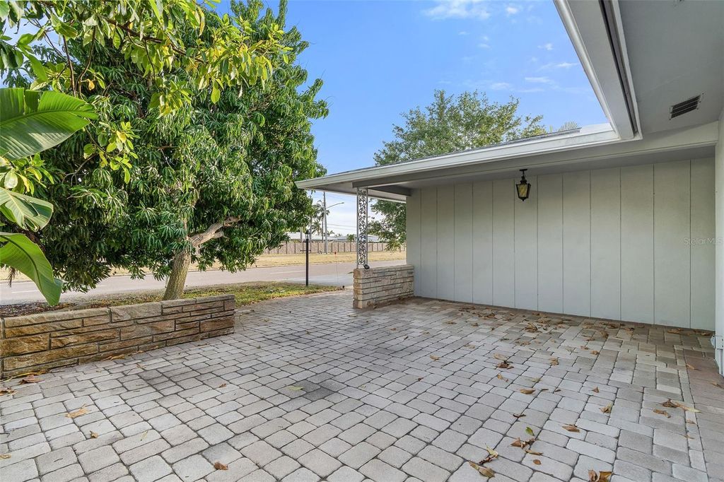 Photo of 14233 102nd Avenue, Largo, FL 33774 (MLS # TB8502717)