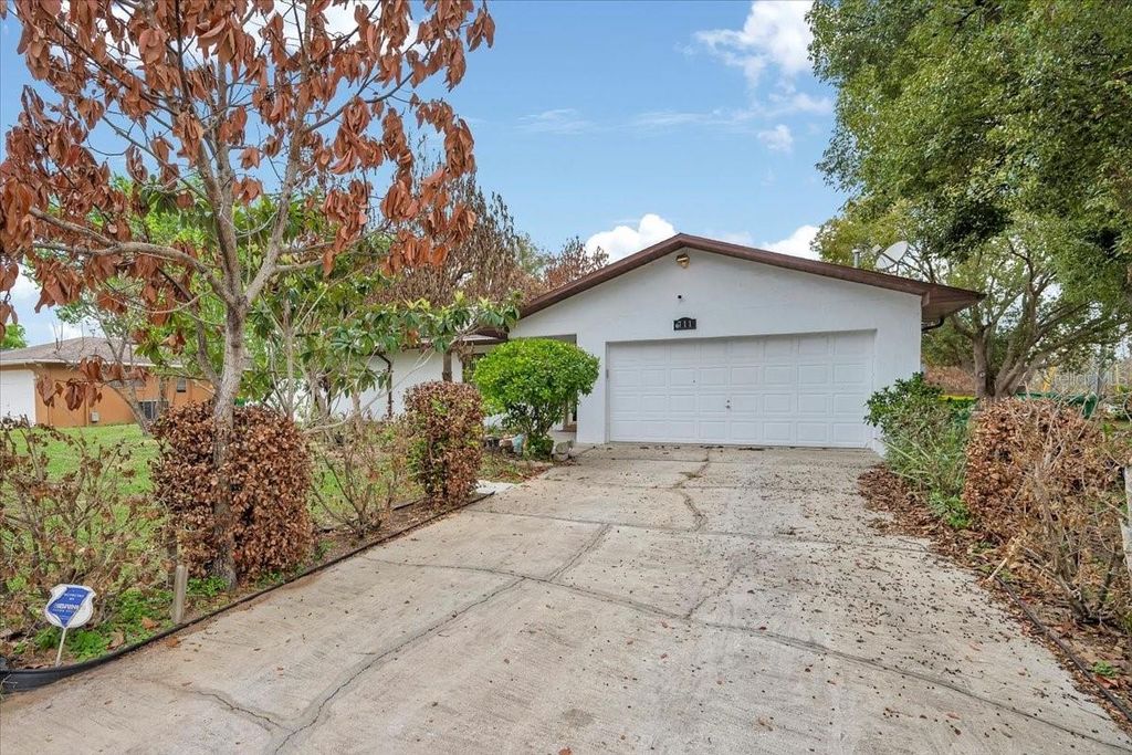 Photo of 711 W Frederick Ave, Dundee, FL 33838 (MLS # L4960429)